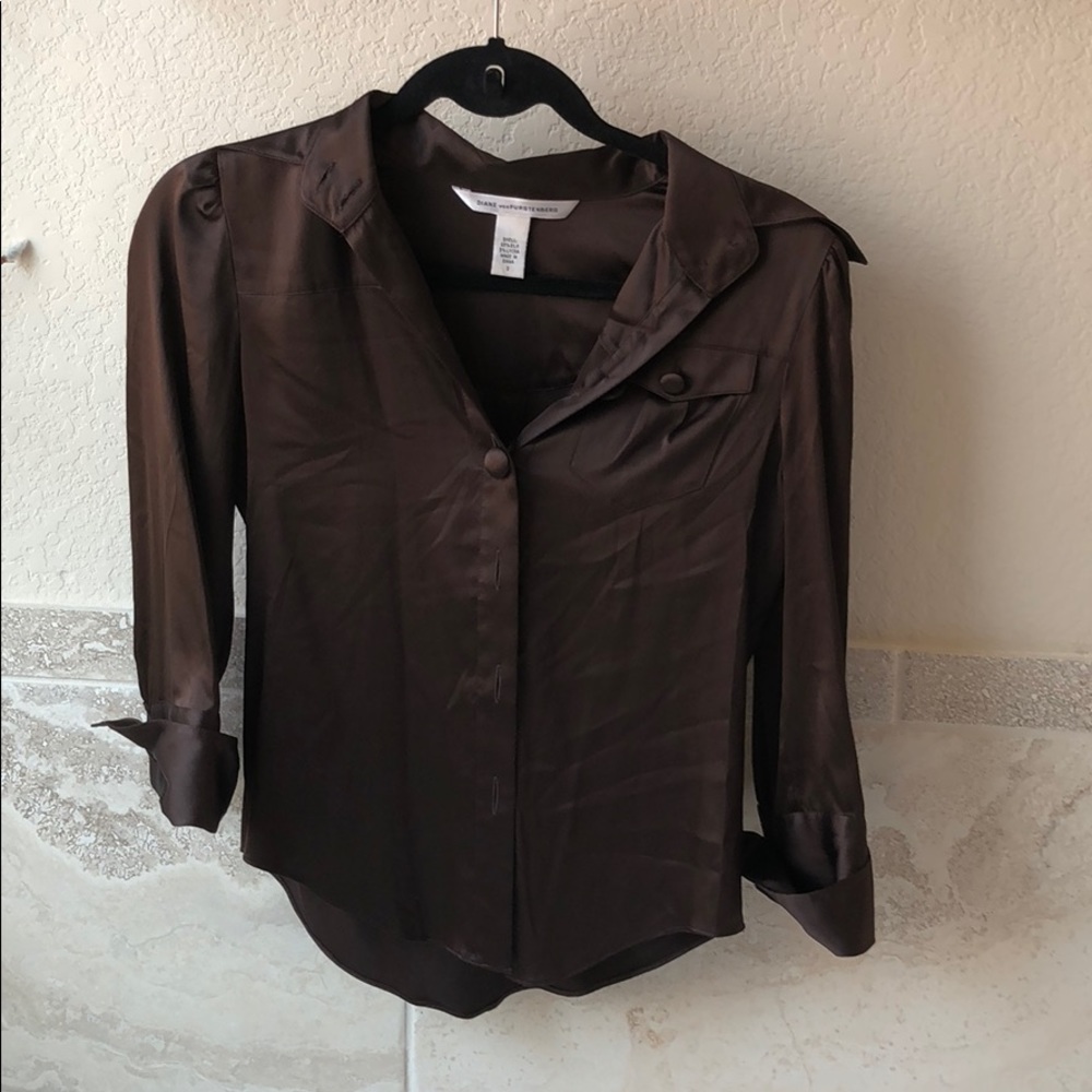 95% silk authentic DVF button down shirt.